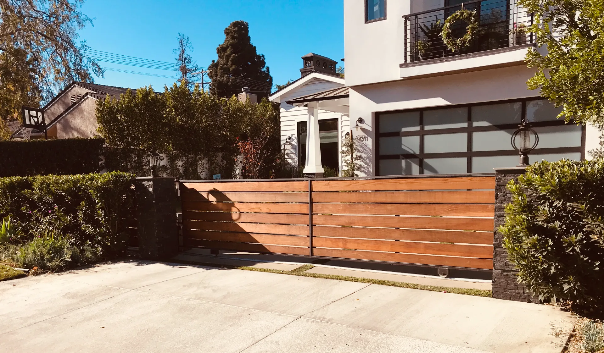 Custom driveway gate by Silence — 24/7 gate repair for Greater LA homes and HOAs