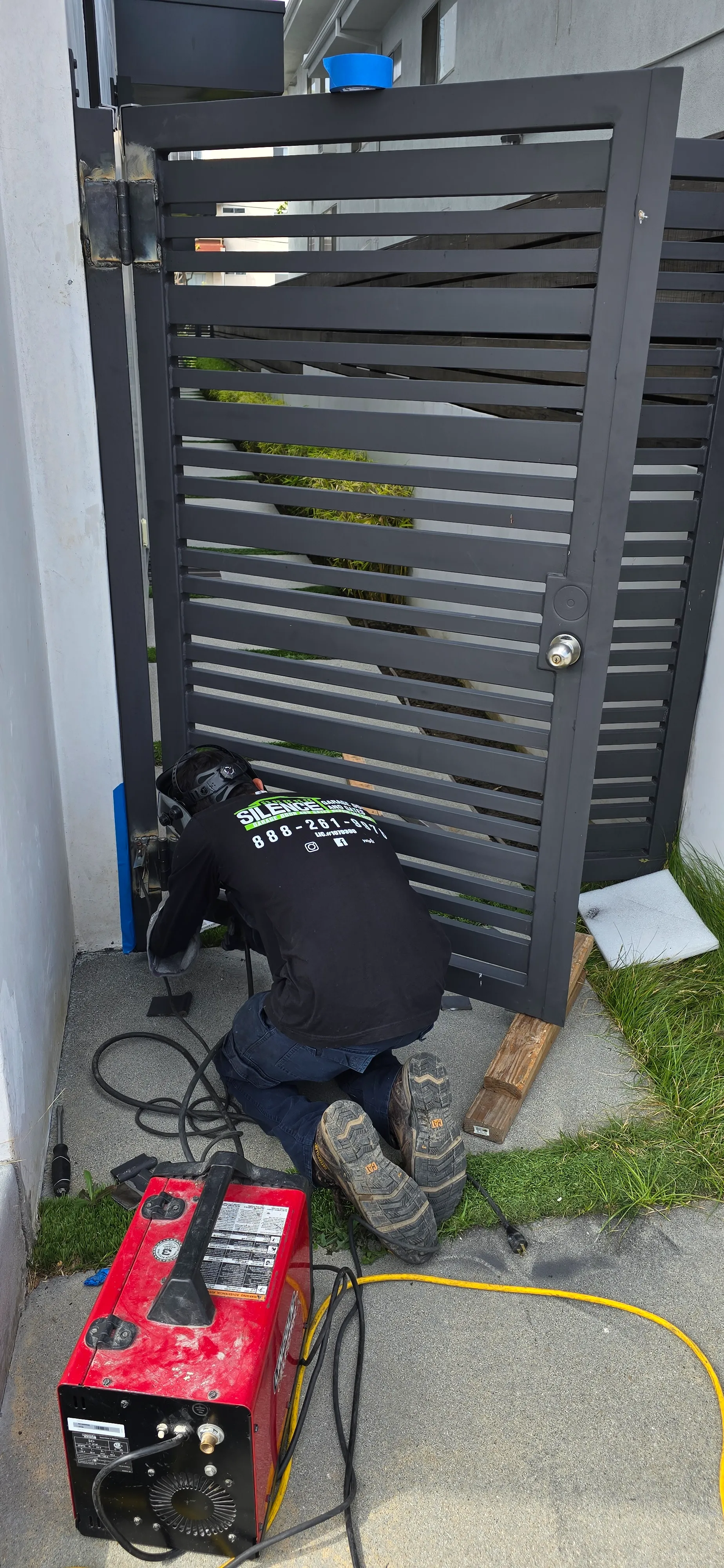 Wrought iron gate work by Silence — welding, hinges, panel replacement