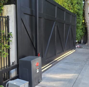 automatic gate repair los angeles technician repairing electric gate