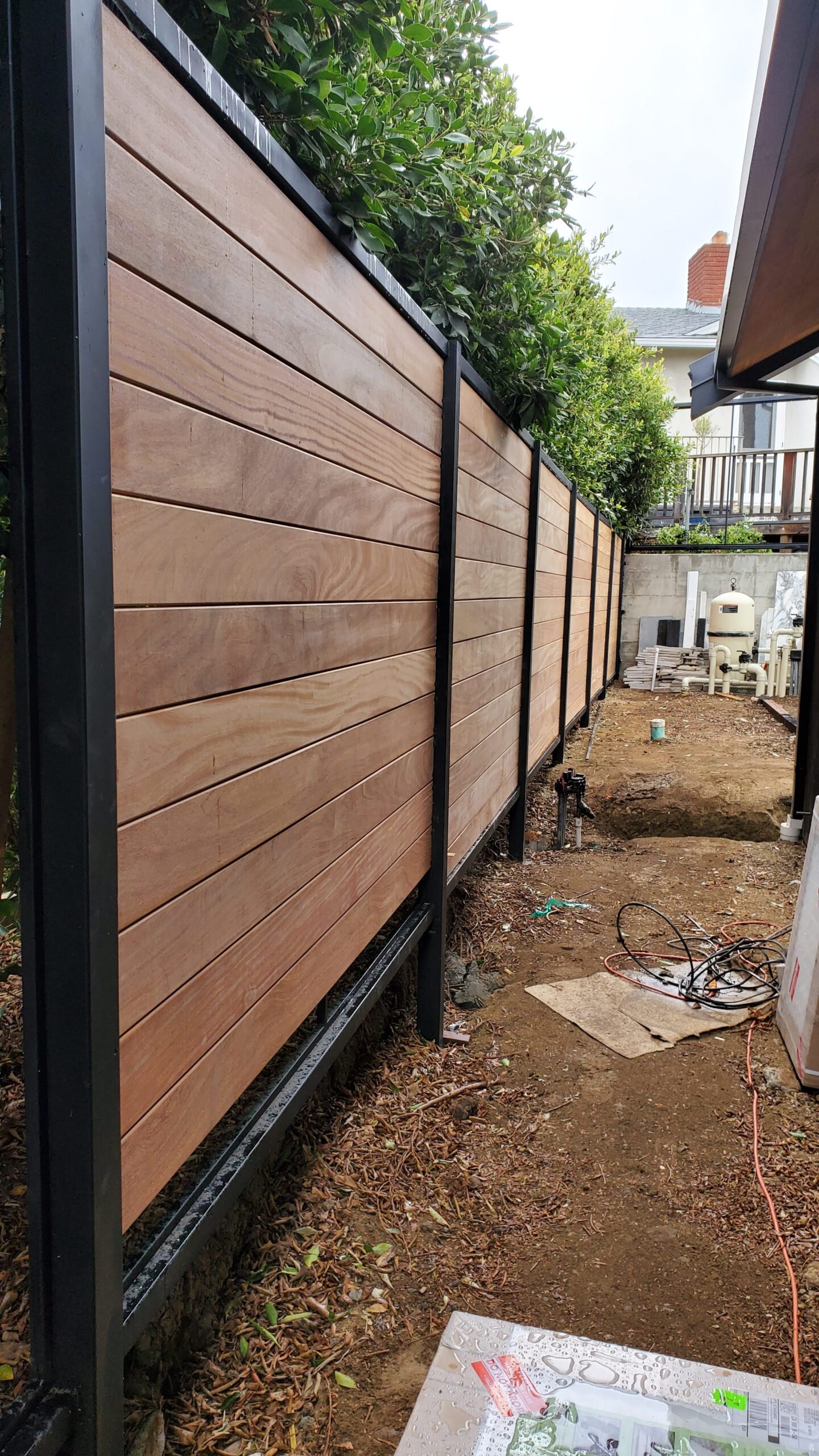 Wood fence installation for classic, natural, and secure property boundaries