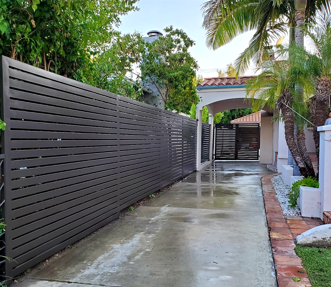 Fence repaired to restore strength, safety, and appearance