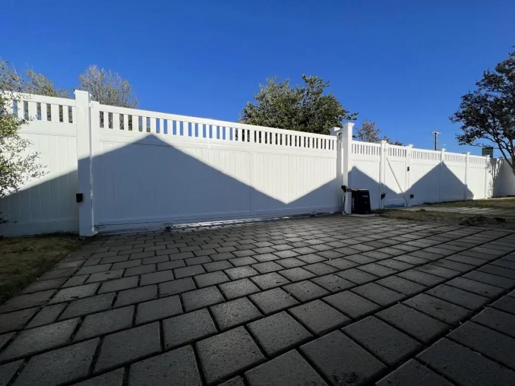 Gate Repair in Pacific Palisades showing a technician fixing a custom home gate in Marquez Knolls