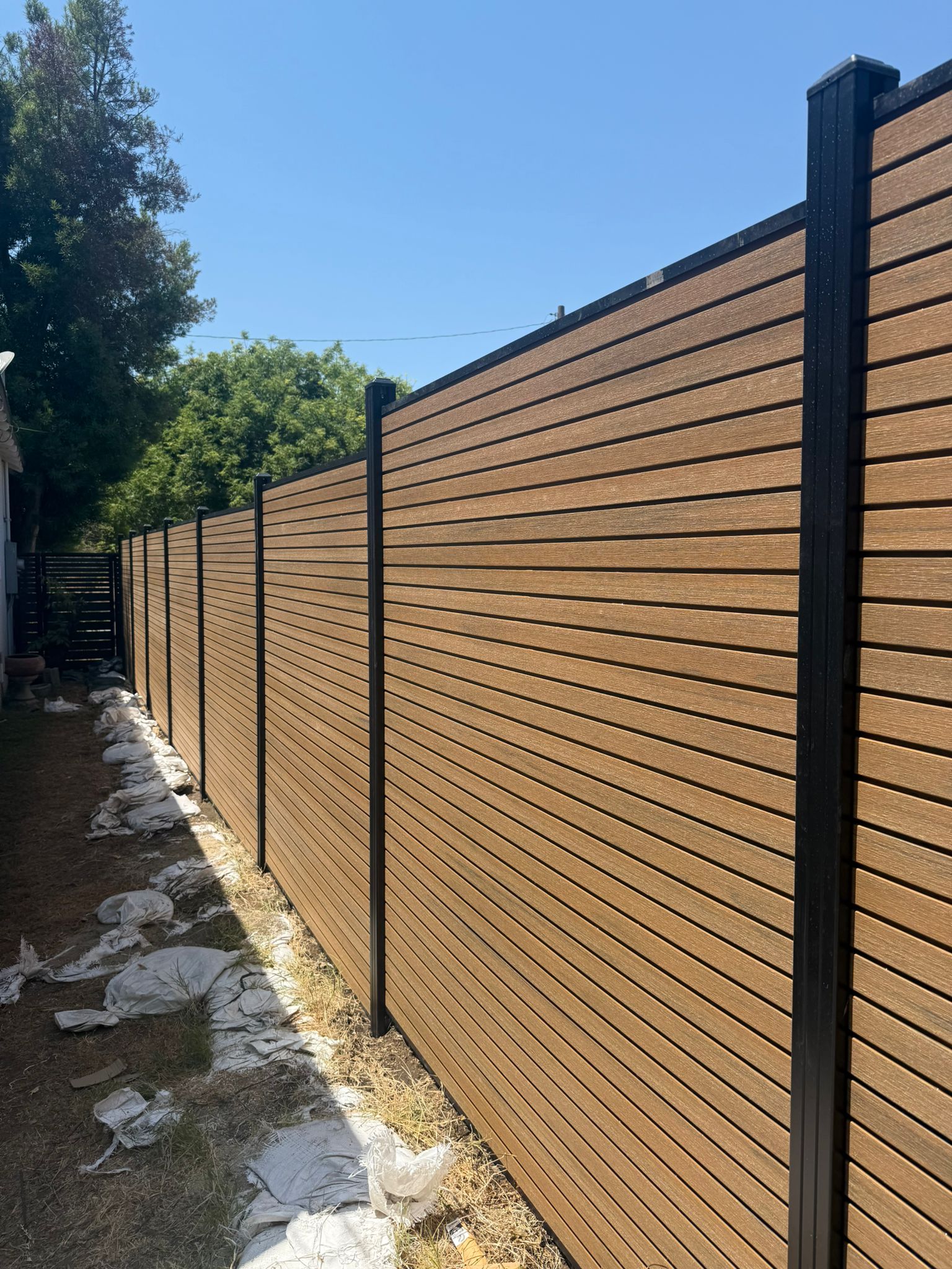 Durable aluminum fence installed to enhance property security and curb appeal