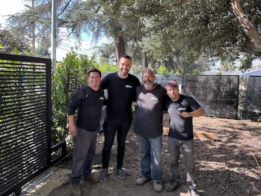 The Silence Garage Door and Gates team at a completed driveway gate in Los Angeles